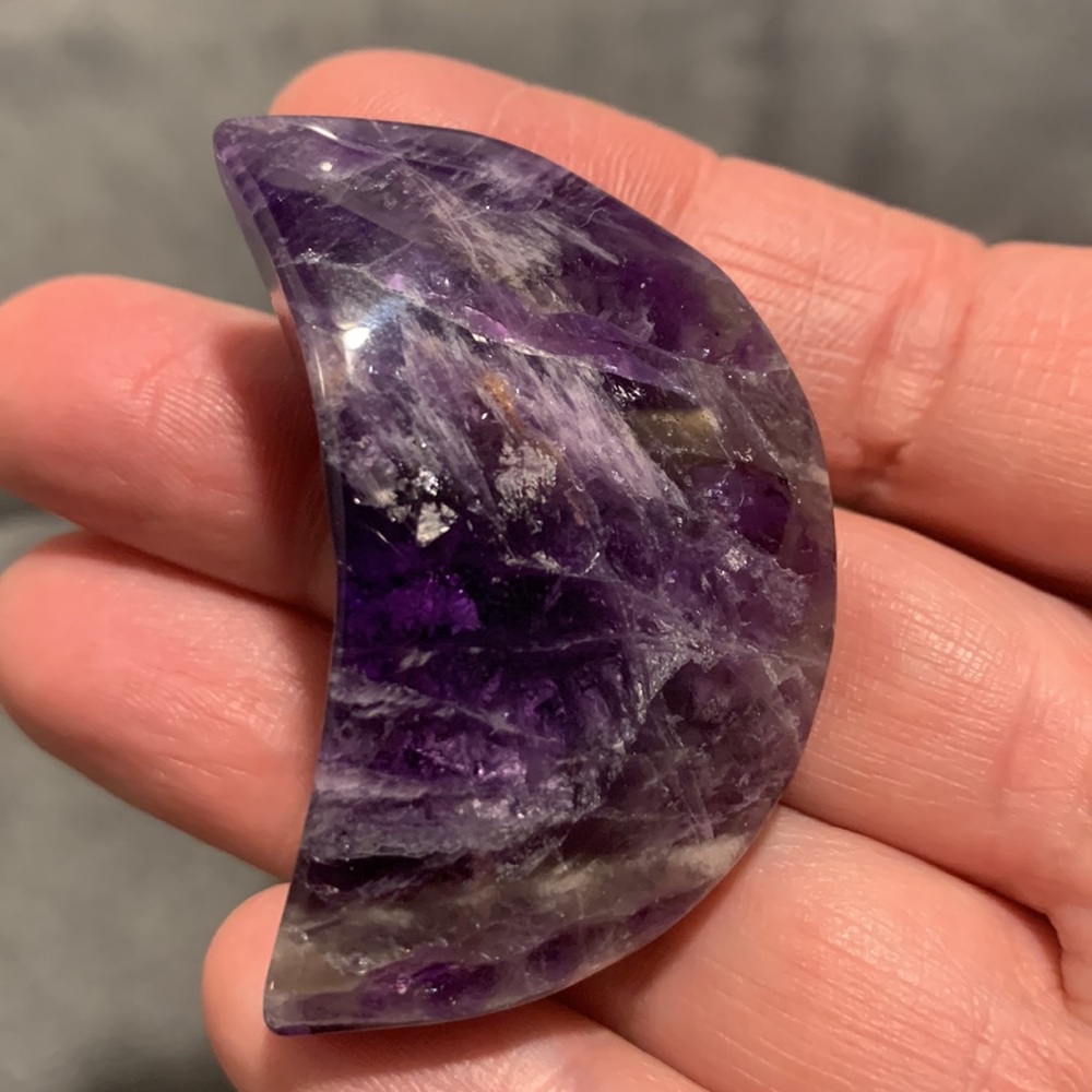 Flashy deep purple amethyst moon crystal. Pagan